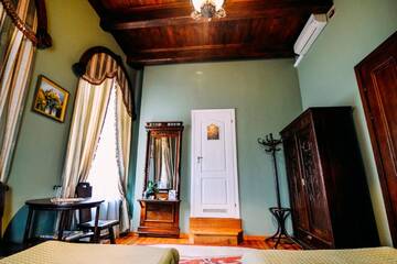 Фото номера Двухместный номер с 2 отдельными кроватями Отель Antique House Hotel г. Дубно 5